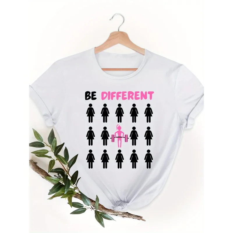 Women's BE DIFFERENT Graphic T-Shirt Bold Pink Text with Female Weightlifting Icon Soft Everyday Casual Fitness Crew Neck Top