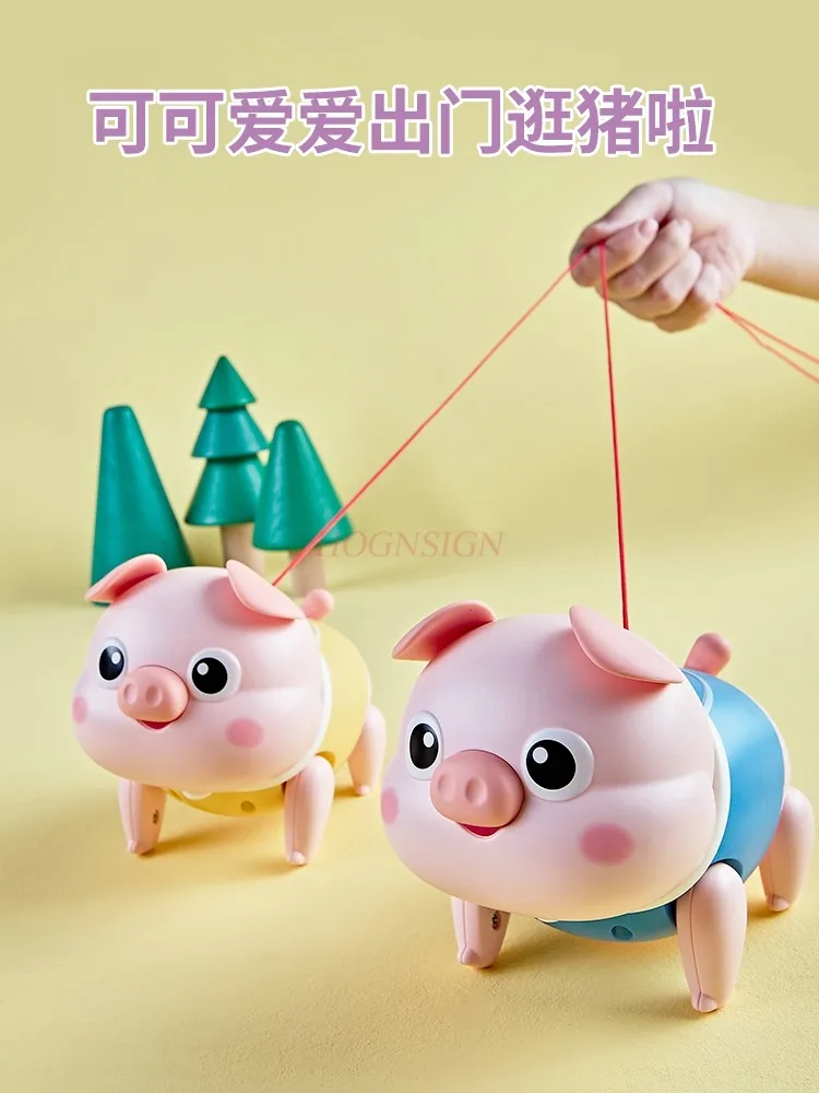 Electric music, rope pulling pig can move, sing and walk, 1-3 year old baby toy