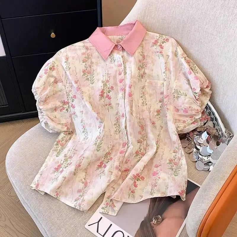 

Artistic Floral Polo Collar Puff Sleeve Floral Print Loose Shirts Women Summer Short Sleeve Korean Fashion Button Up Shirts 2025