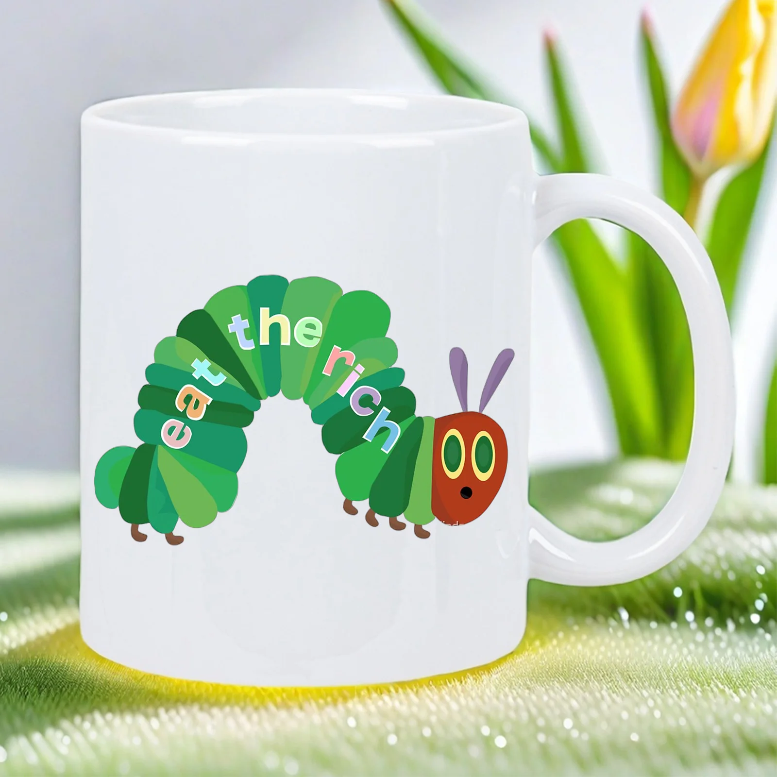 

Funny "Eat the Rich" Cartoonish Print Ceramic Coffee Mug - White with Green & Purple Worm Design, Perfect for Office Humor