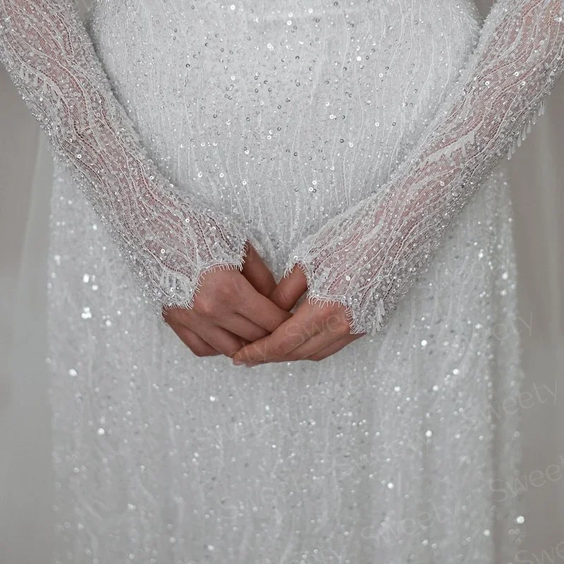 Abito da sposa a maniche lunghe con collo alto Elegante pizzo ricamato con perline Abito da ballo a trapezio con bottoni Vestido De Casamento personalizzato