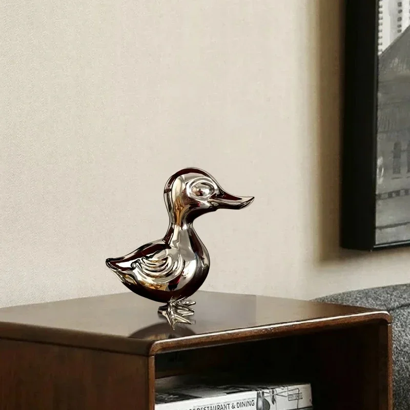 

Modern home decoration features a craft stainless steel duck sculpture with mirror polishing.