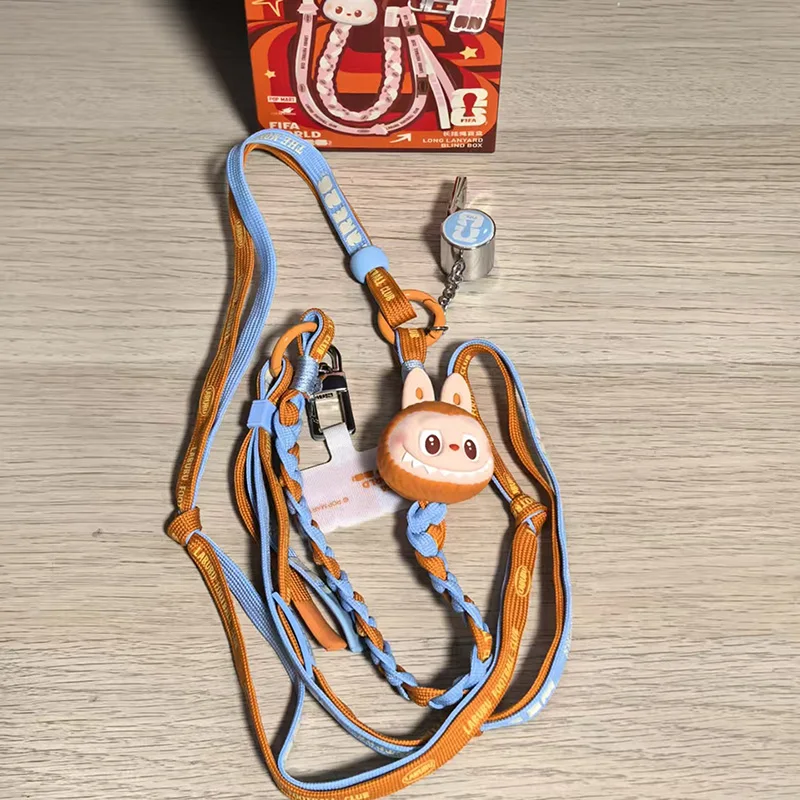 

POPMART Labubu The Monsters Fifa Series: Мобильный держатель для телефона (слепая коробка), милая аниме-фигурка для рабочего стола