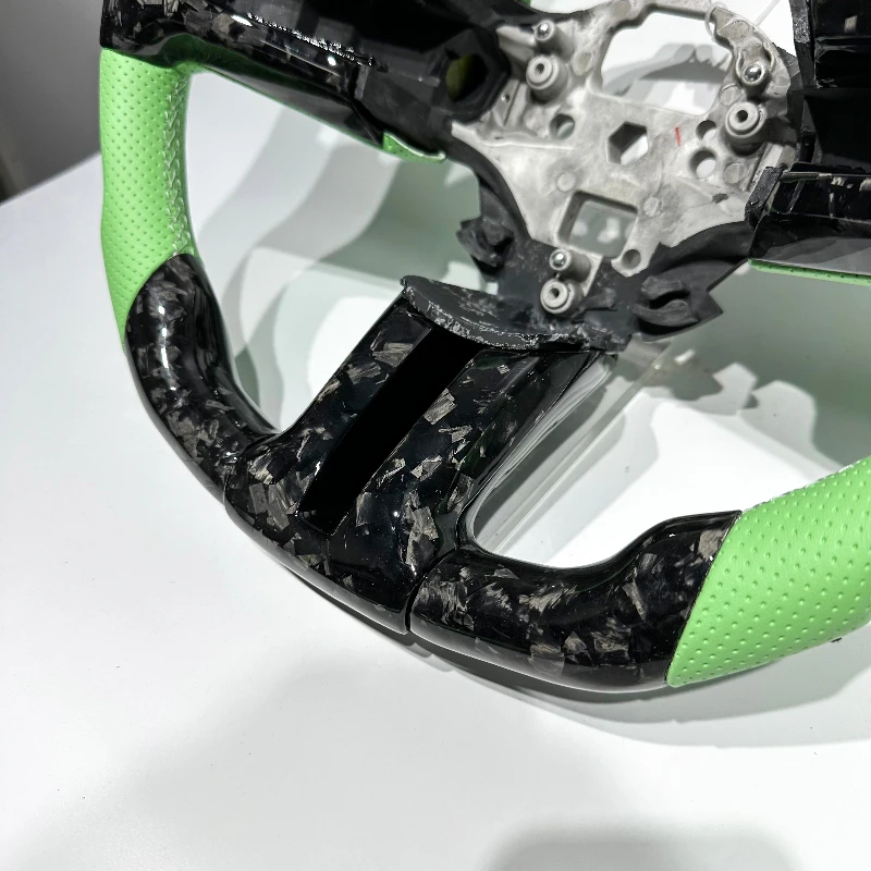 Carbon fiber steering wheel for Ford Mustangs manufactured before 2014, customization available, direct from manufacturer. view 3