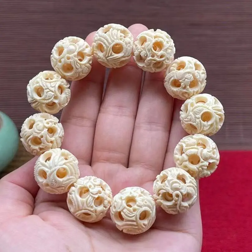 

Ice Material Mammoth Ivory Bracelets Art Carving Ghost Worker Exquisite White Hollow Ball 16MM Hand String WenPlay Accessories