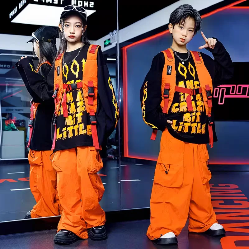 

Комплект в стиле хип-хоп для мальчиков, оранжевый жилет, брюки-карго, костюм для джазовых уличных танцев для девочек, детская одежда, детская уличная одежда Kpop