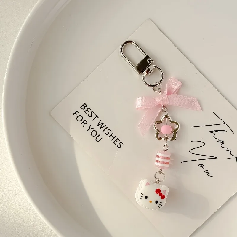 Kawaii hello kitty chaveiro bonito dos desenhos animados arco corrente do telefone móvel viagem feminino suprimentos decoração de mesa presente do estudante atacado