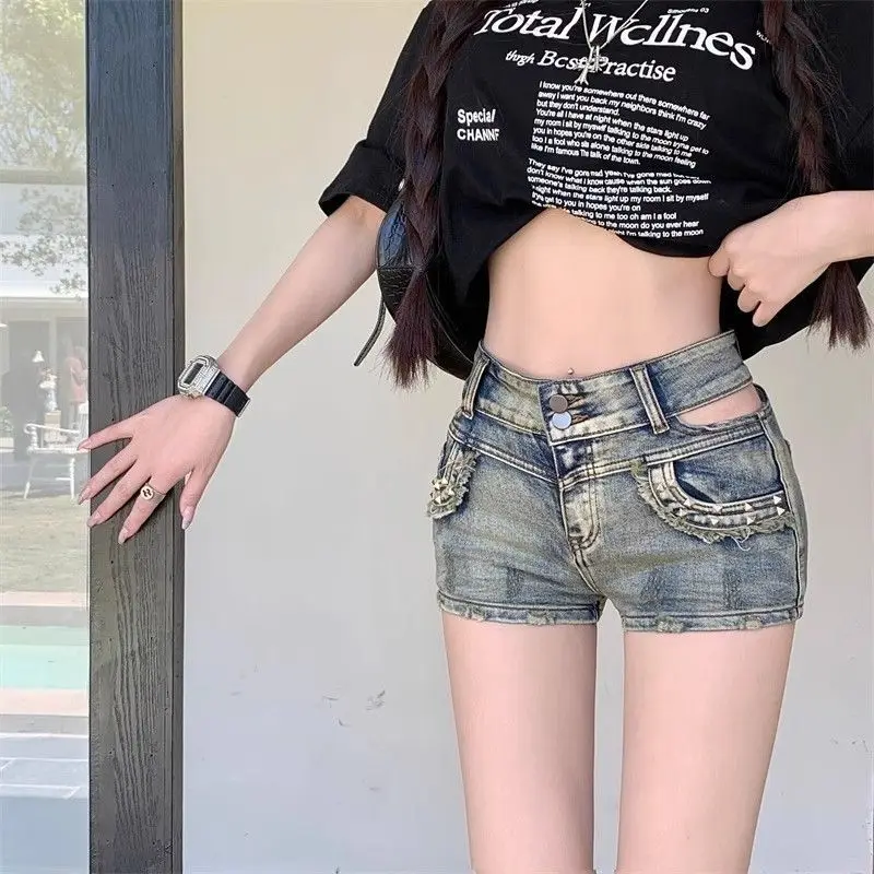 アメリカンホットガールサマーホローヒップハイウエストスリム弾性デニムショートパンツ