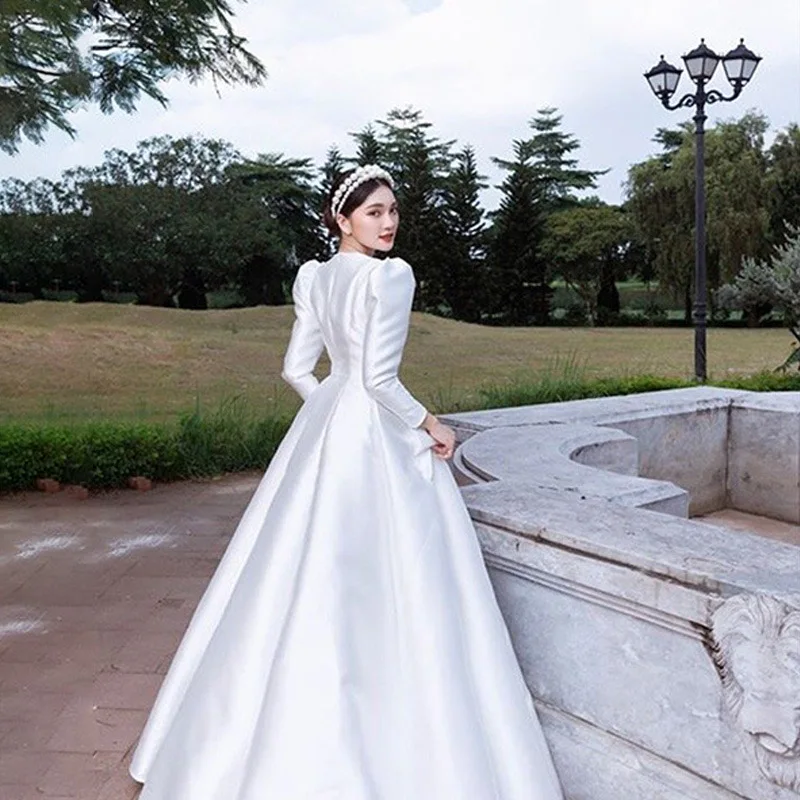 Elegante Vestido De novia De manga larga con cuello redondo, cremallera clásica, largo hasta el suelo, tren pequeño De lujo, bata De satén