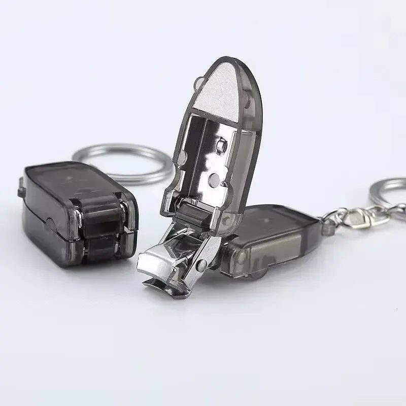

2023 Hot Best New Seller Mini Portable Nail Clipper Plastic Handle Rotary Nail Clipper with Key Ring from China Factory