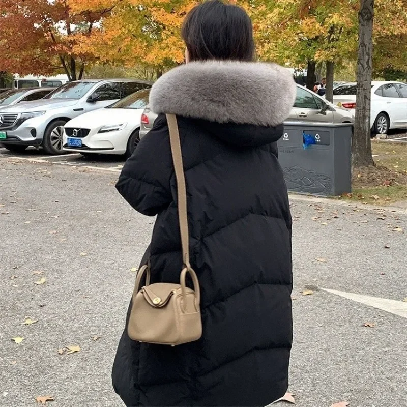 Abrigo largo con capucha para mujer, chaqueta de plumón de pato blanca cálida y gruesa con cuello de pelo de lujo a la moda, doble tapeta, invierno