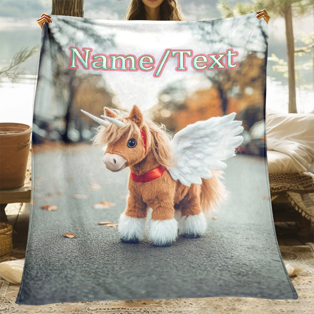 

A personalized name blanket with a magical pony pattern printed on it. A lightweight flannel blanket suitable for sofa beds,