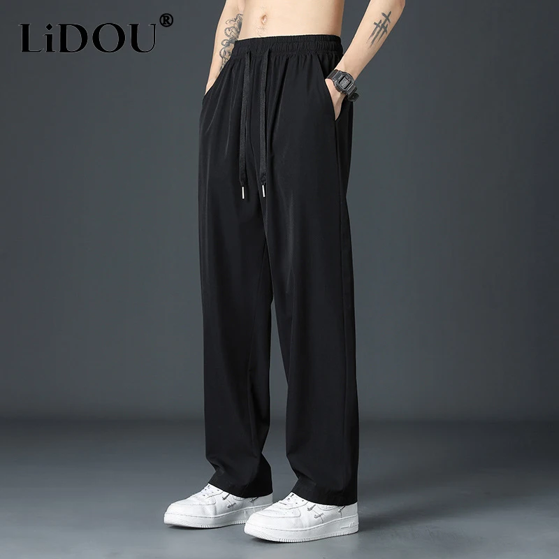 

2023 Summer New Solid Color Fashion Loose Comfortable Straight Pants Man Elastic Waist Drawstring Pockets Street Wide Leg Trouse