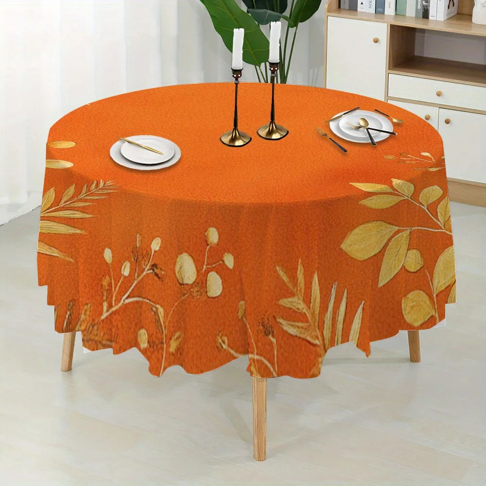 One autumn-themed circular tablecloth with a golden leaf pattern, perfect for enhancing the circular shape.zyc