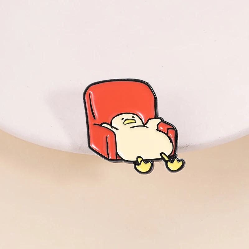 Cute Lying Duck Enamel Pin Cartoon Tired Duck Lying By The Sofa Animal Brooch Lapel Badge Fashion Jewelry Gift for Kids Friends