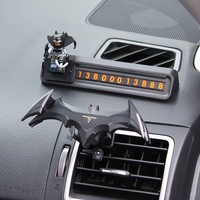 Hot Batman Gravity Buckle Type Car Mobile Phone Holders Air Outlet Navigation Support Frame Suitable For All 4-6.5 Inch Devices