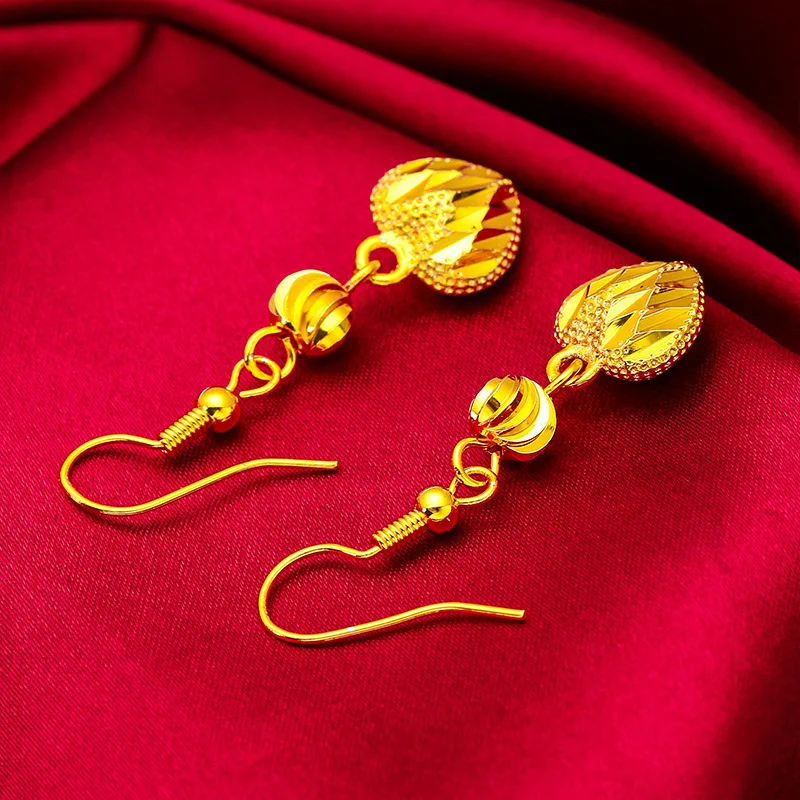 

Tassel Heart Earrings for Women (24K AU999) - Hollow Heart with Tassel, Shiny Chain Design, Wedding Look, Love Thread Bonding