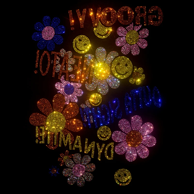 Stitched diamond flowers are ironed onto sweaters, jeans, jackets, outerwear and accessories. Fashionable patches.