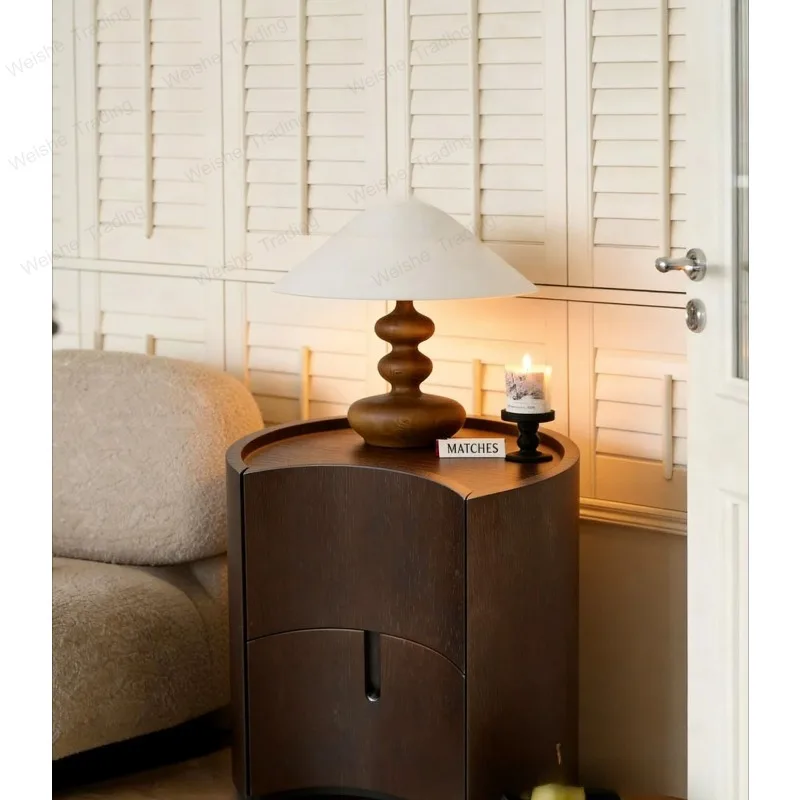 

Minimalist curved medieval designer high-end bedroom home storage bedside table