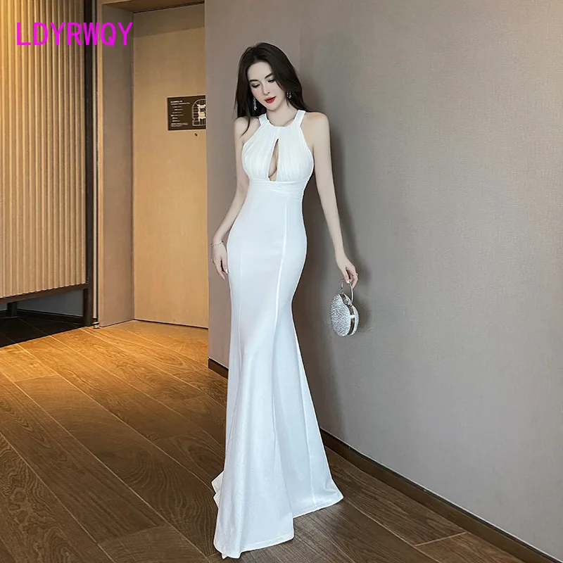 Nighttime white dress, long skirt, sexy temperament, host fish tail skirt, nightclub hanging neck and floor mopping dress