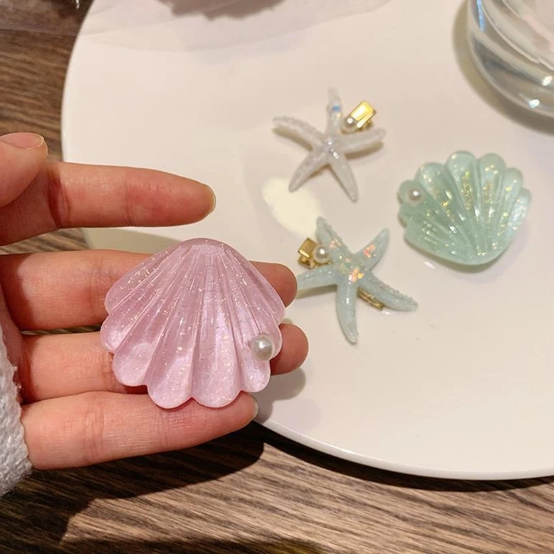 女性用ファッショナブルなマリンインスピレーションのヘアピンシースター/シェル型ヘアアクセサリーミュージックフェスティバルスタイルのヘアジュエリー