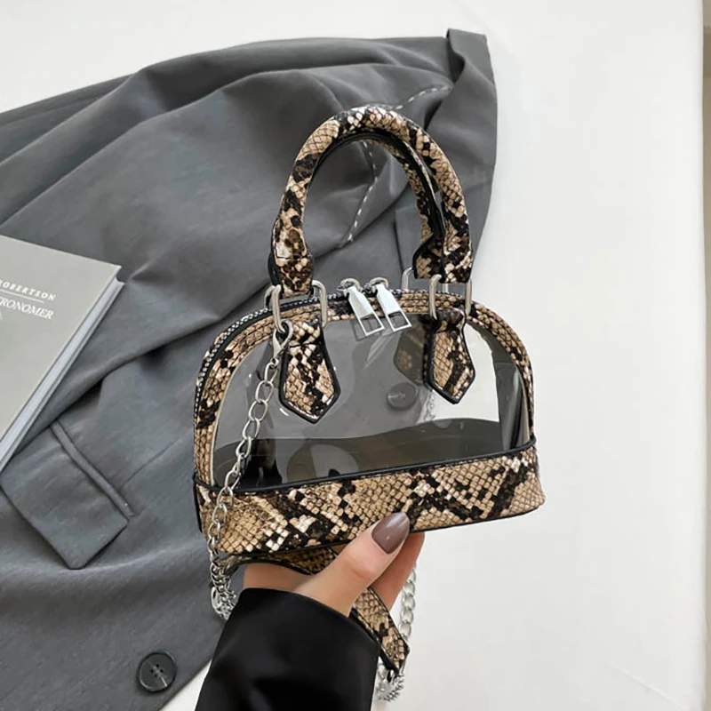 bolsa-transparente-mini-essencial-de-pvc-com-estampa-animal-e-alca-superior-para-festas-e-passeios-casuais-–-tendencia-e-estilo