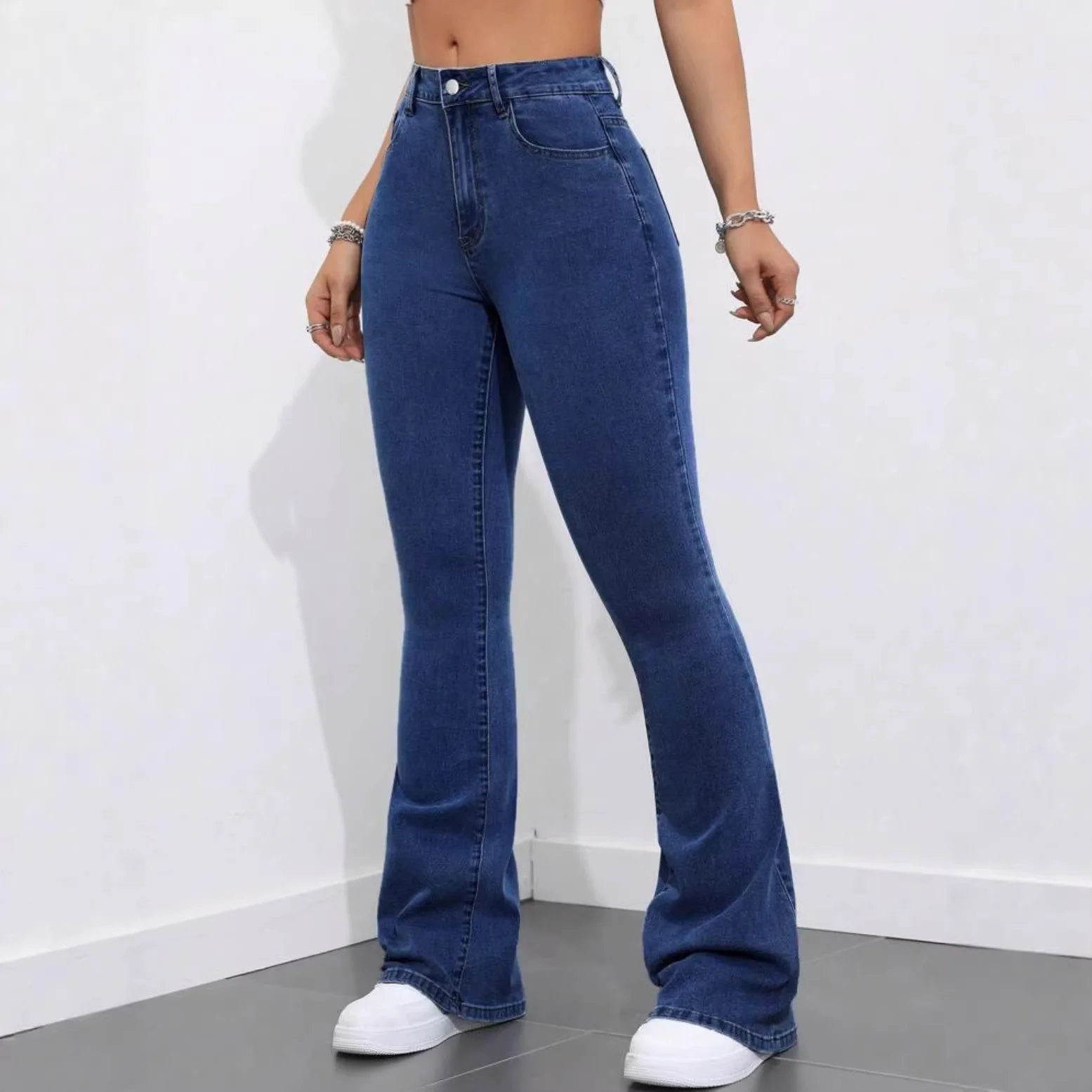 Dark Blue High-Waisted Flare Jeans with High Elasticity, Slim-Fit Cut to Accentuate a Slender Figure and Elongate the Silhouette
