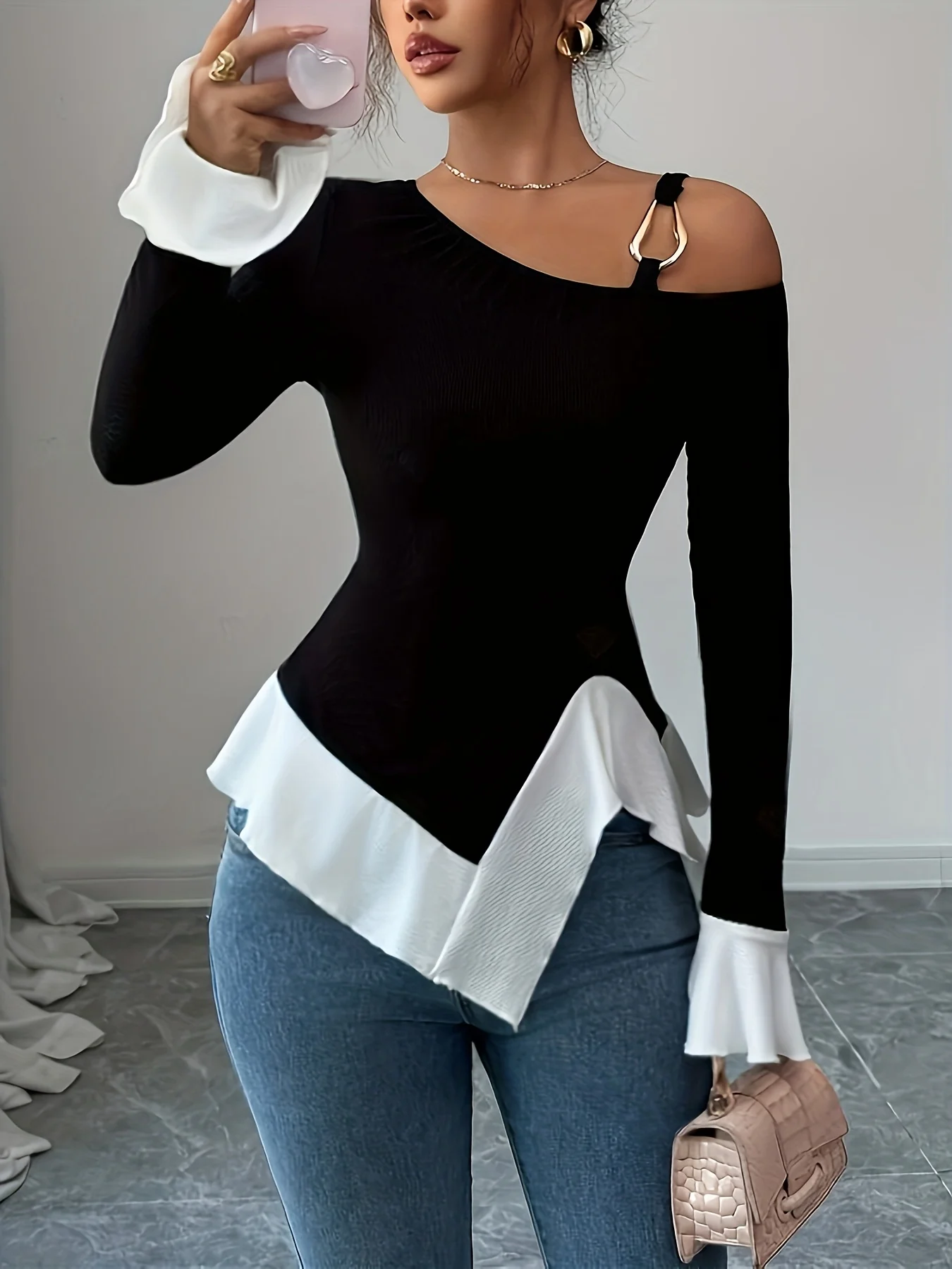 Elegant and fashionable off shoulder long sleeved T-shirt with contrasting color and asymmetrical hem top