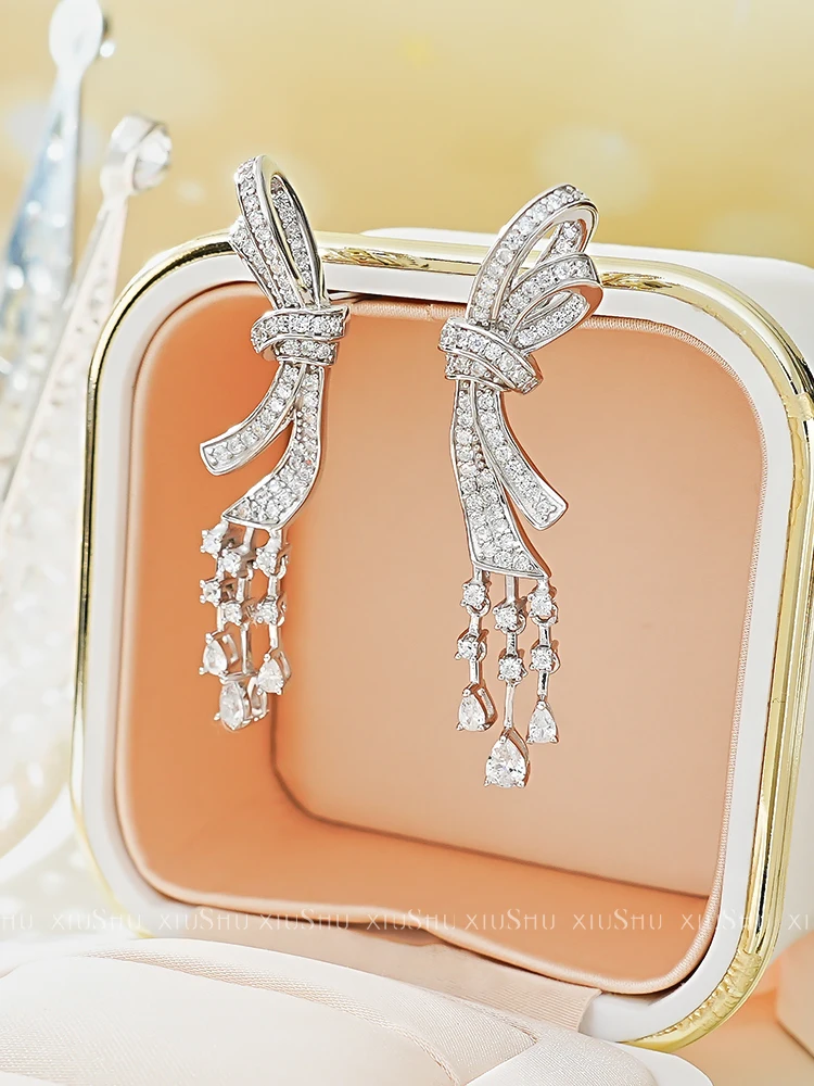 New bow earrings 925 sterling silver inlaid with high carbon diamond light luxury earrings, versatile and niche wedding jewelry