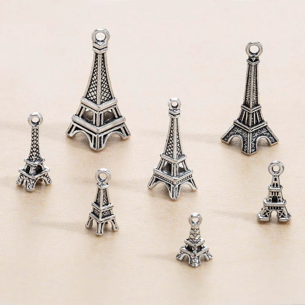 Retro-style Eiffel Tower alloy pendants in various sizes are preferred DIY accessories