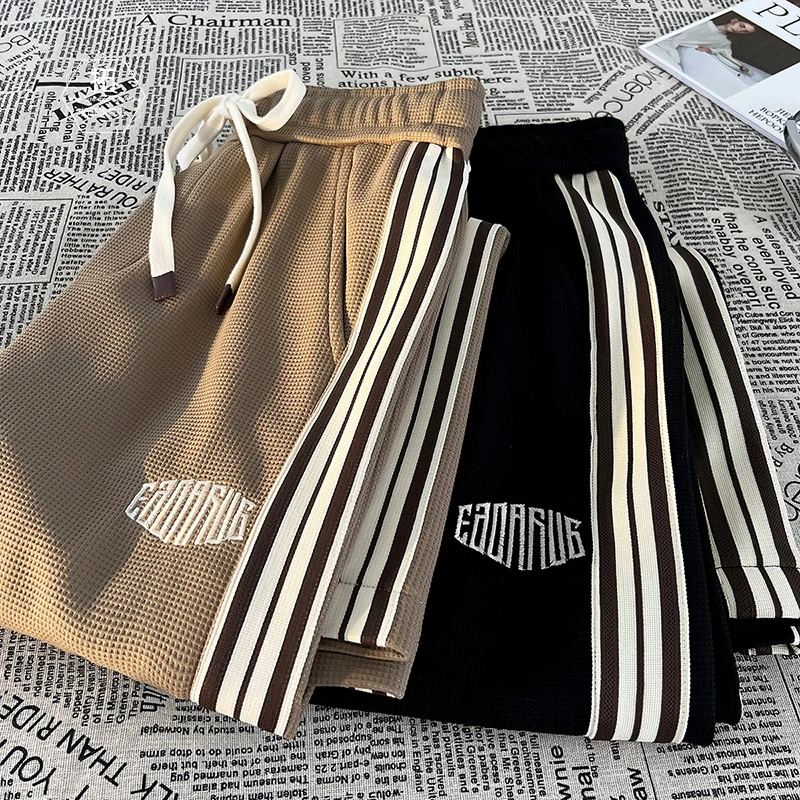 

Модные повседневные брюки оверсайз для мужчин с вышивкой, широкие прямые штанины, молодежный стиль, средняя/низкая посадка, полиэстер...