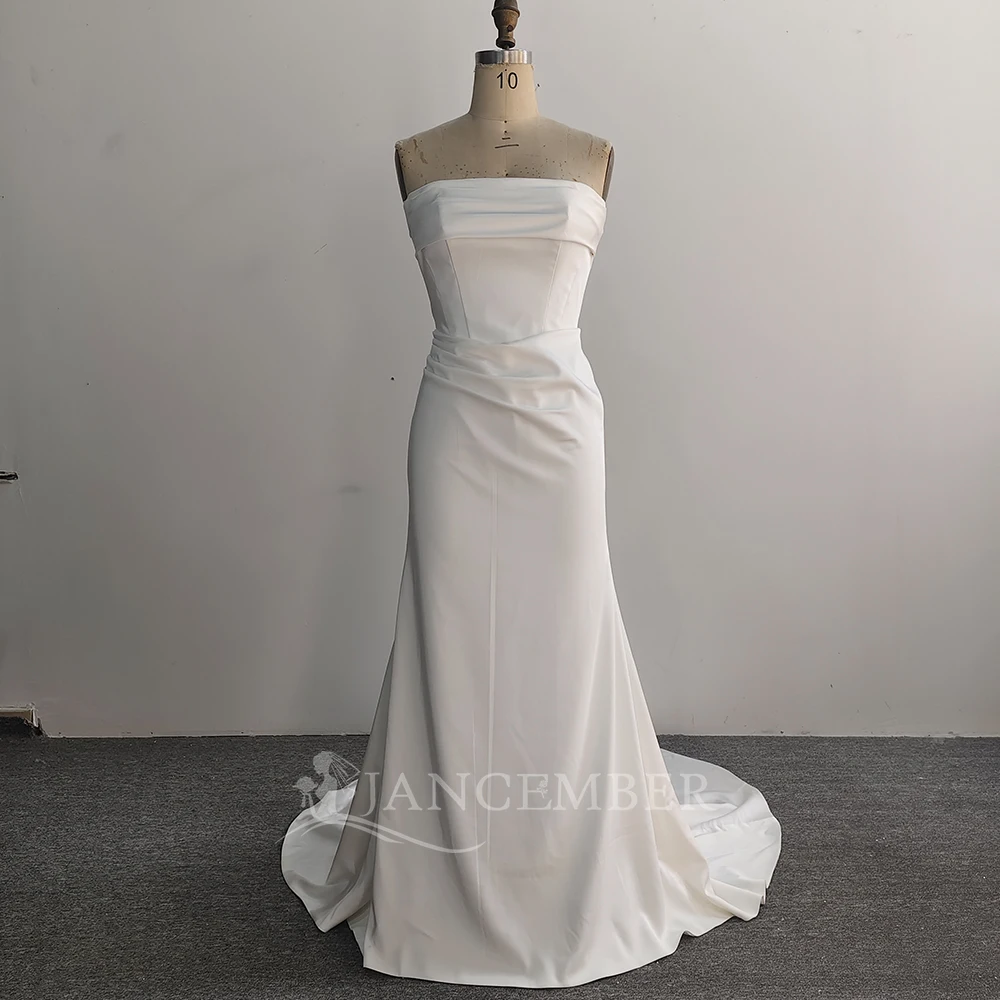 

Высококачественное атласное свадебное платье на заказ, классическое без бретелек, с кружевной спинкой и шлейфом.