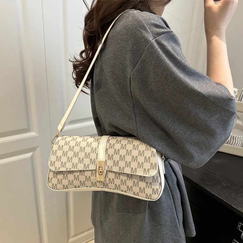 

Новые модные женские сумки, высококачественная сумка с принтом на одно плечо, сумка подмышки, дизайн с замком, ретро-седло, модная элегантная женская сумка