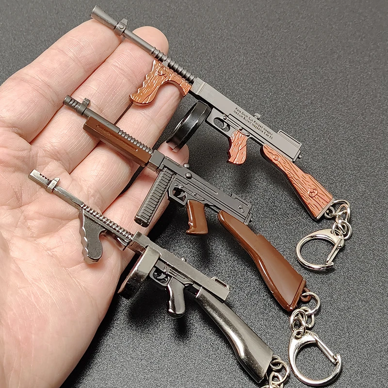 

Mini Gun Shape Model Gun Keychain Pendant Special Backpack Decoration Adult Toy Llavero Chaveiro Portachiavi Sleutelhanger