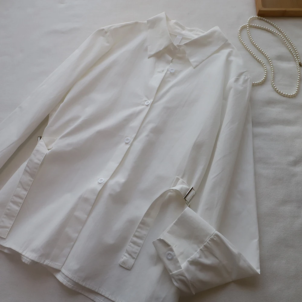 Camicia bianca a maniche lunghe versatile che abbraccia la vita Donna 2025 Autunno Nuovo stile coreano Moda elegante monopetto Top per pendolari