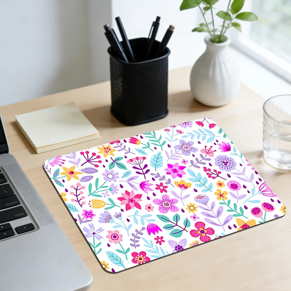 

1 шт. красочного коврика для мыши с цветочным узором, состоящего из плотно расположенных маленьких цветов розового, желтого, фиолетового и других цветов.