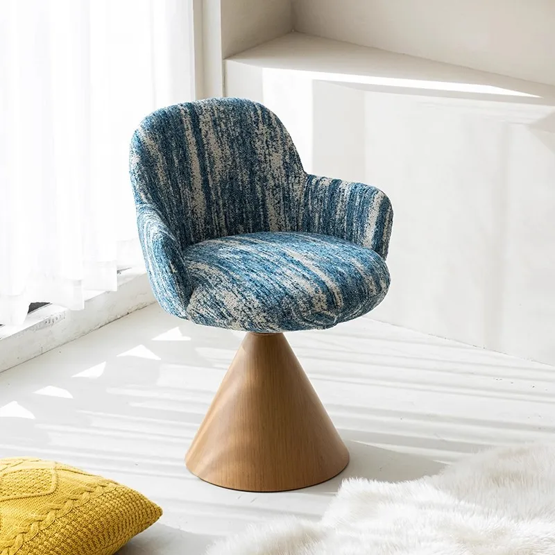 

Medieval style wabi-sabi wind dressing stool light luxury high sense simple designer rotatable single chair bedroom makeup stool