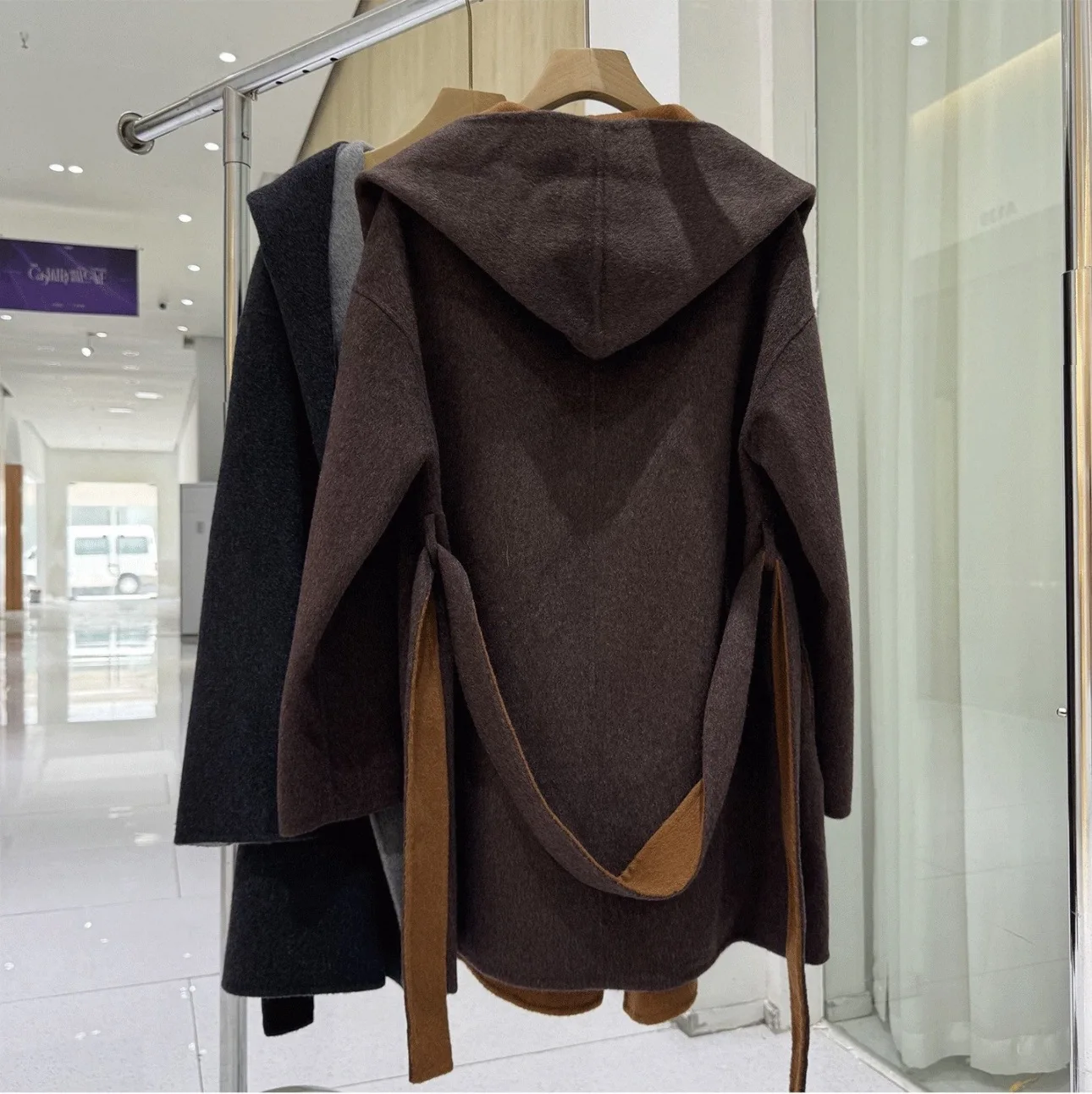 Light Luxury Hooded Double Faced Wool Coat Women Mid Length Contrast Color Belted Woolen Outerwear New Arrival for Winter 2026