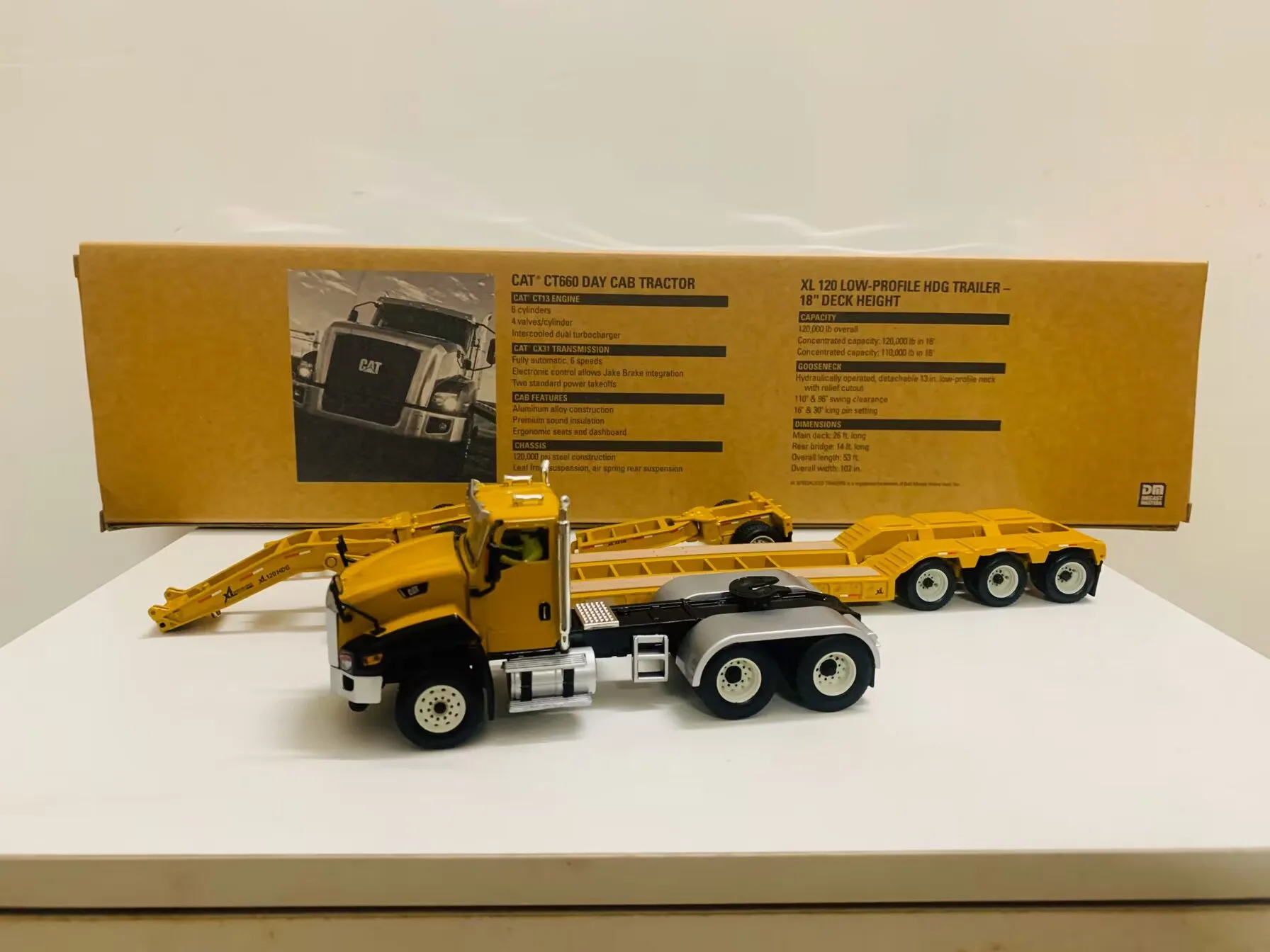 DM CT660 Day Cab Tractor & XL 120 Low-Profile Hdg Trailer 1:50 Scale Metal By DieCast Masters 85503C Collectible Model New Box