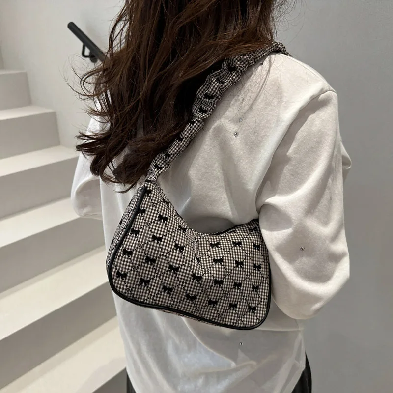 

Casual and fashionable niche printed handbag for women in 2025 new bow-shaped summer underarm simple shoulder bag