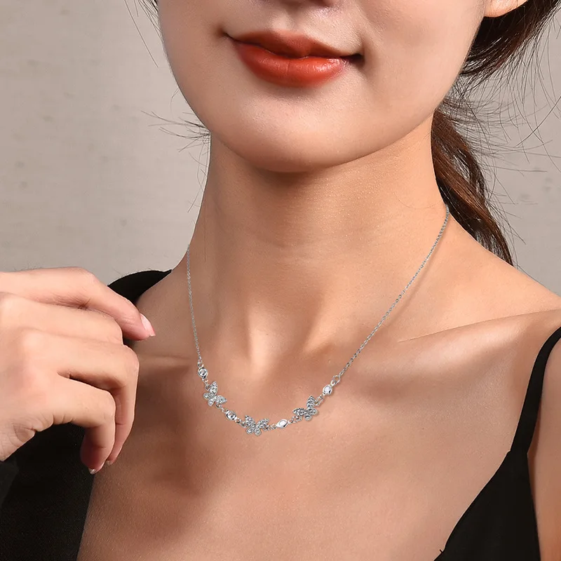 A brand-new simple three-butterfly single-layer collarbone chain necklace exudes a sweet feminine charm