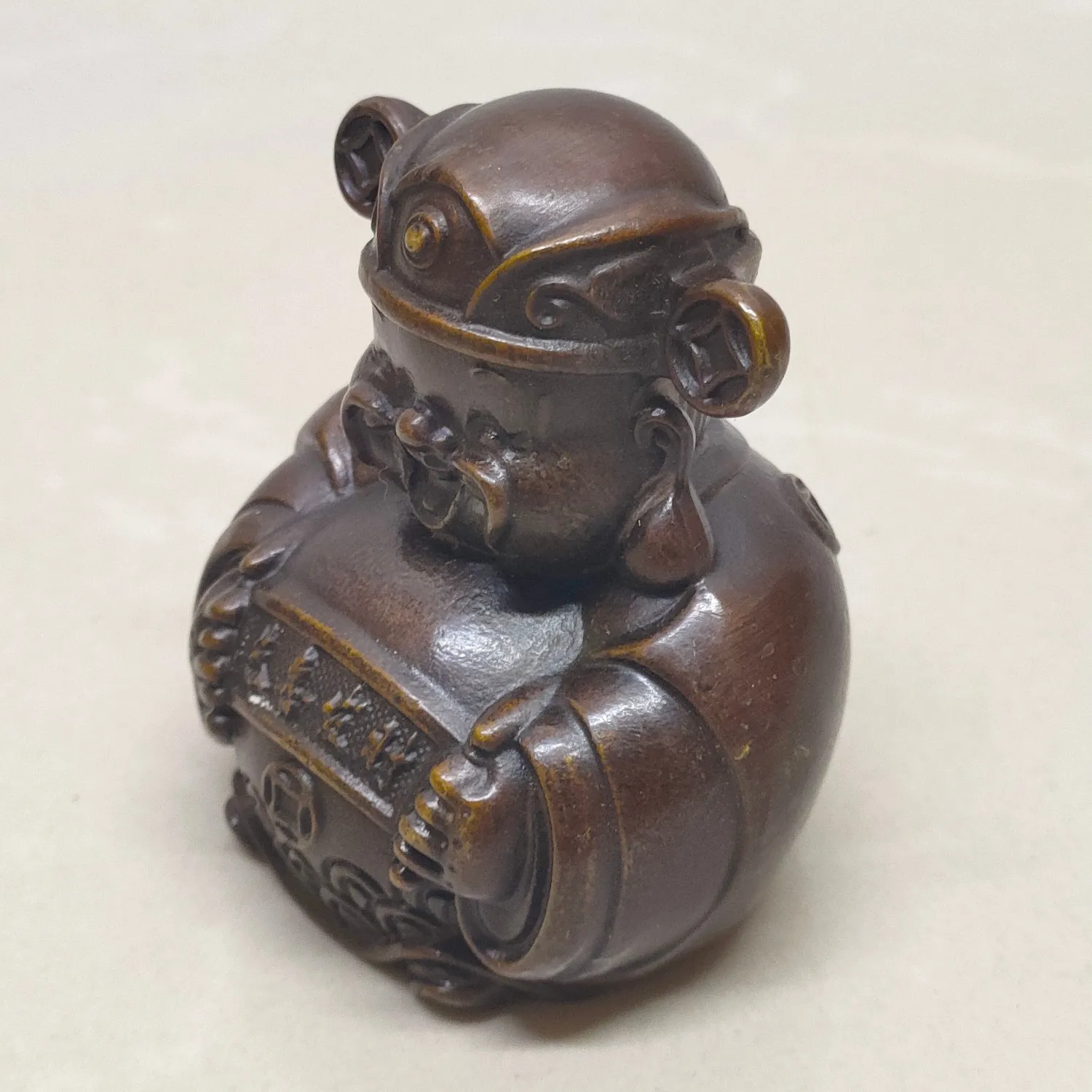 A small trinket, a little money god. Material: Brass imitation of old bronze with antique finishing process.,Free shipping