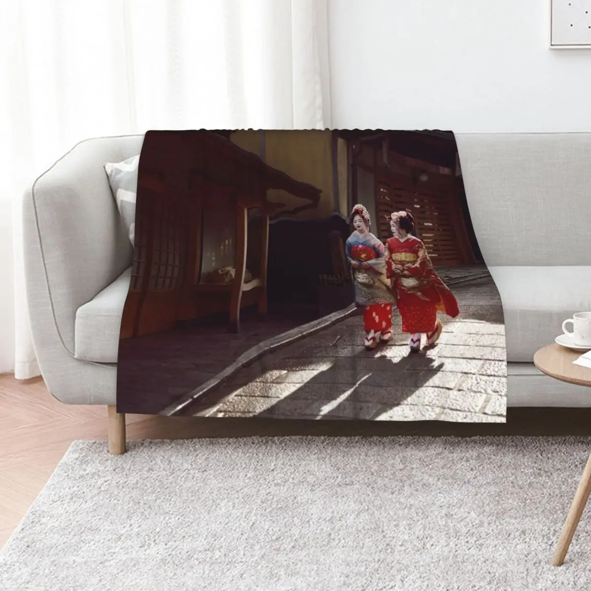 

Two Geisha apprentices Maiko in bright kimono walking down an old street in Kyoto Japan art photo print Throw Blanket