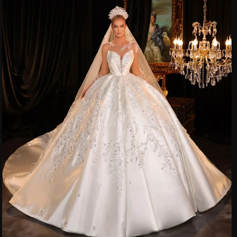 

Customized Sheer Neck Shinny Appliques Rhinestones Wedding Dress Long Sleeves Robe De Mariée Satin Ballgown Puffy Bridal Gowns