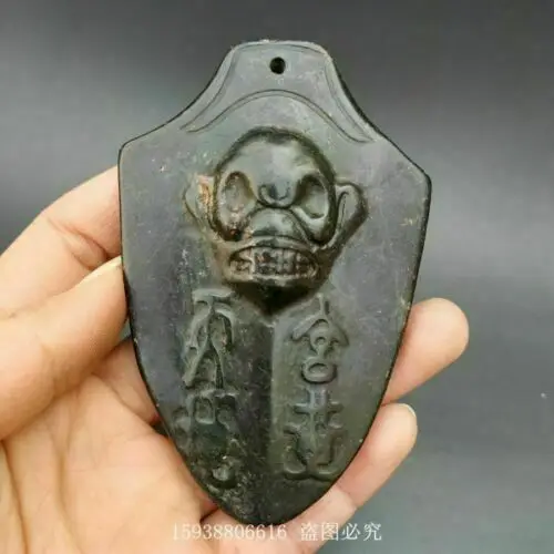 

Chinese Red mountain culture collection meteorite carving skull Jade brand Pend