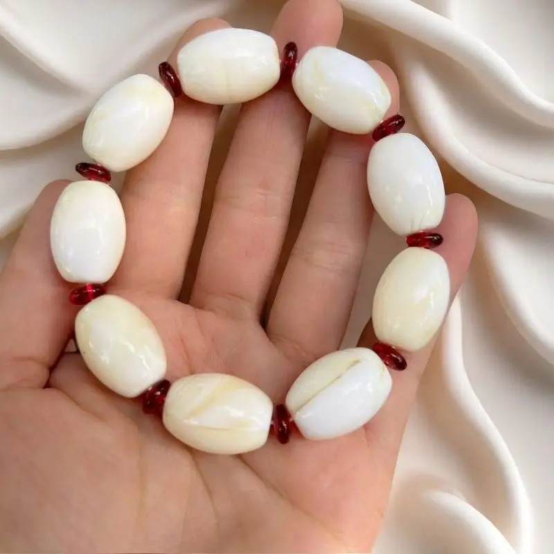 Optimized Russian freeform , tea , porcelain white bracelet, old amber single-loop Buddh