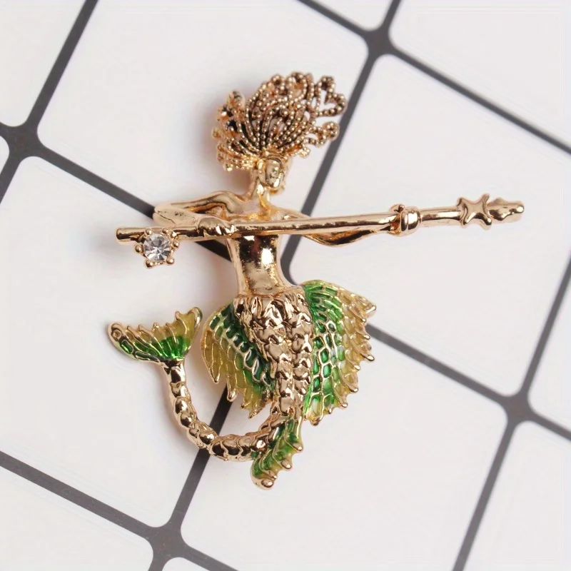 Elegant and novel mermaid brooch holding a weapon and diamond-encrusted antique style coat accessories