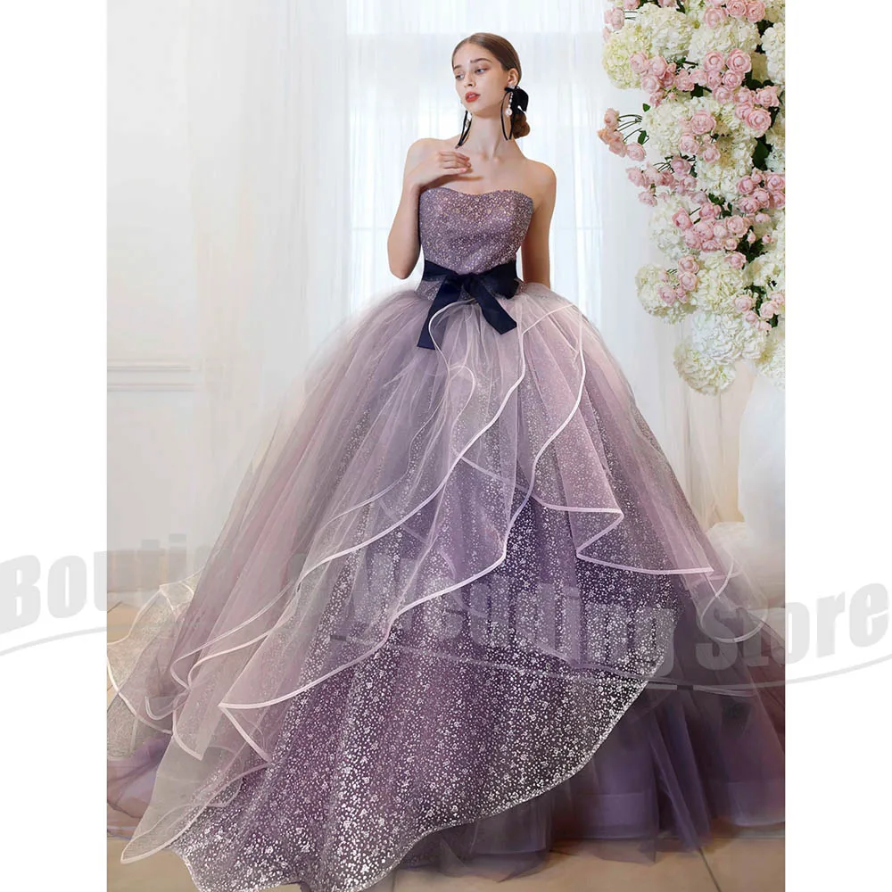 

Women's Strapless Sequined Evening Dress with Black Bow Belt Ruffled Tulle Ball Gown Fashion Sweep Train Elegant Party Dress