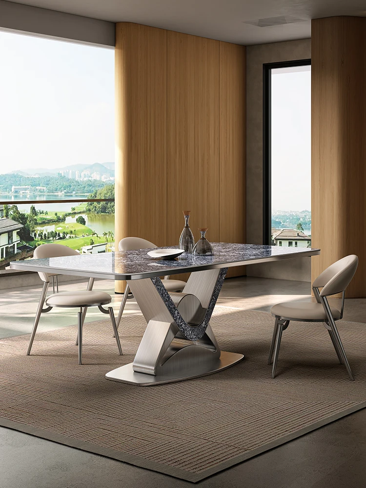 

Italian rock panel dining table combination modern minimalist villa luxury stone marble dining table and chairs