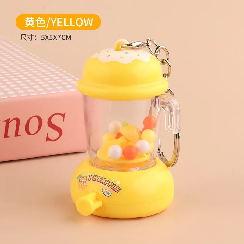 Dessin animé amusant presse-agrumes porte-clés pendentif Mini presse-agrumes breloques enfants jouets créatif sac à dos breloques accessoires presse rotatif presse-agrumes jouet